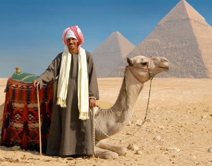 Man with camel at Pyramids